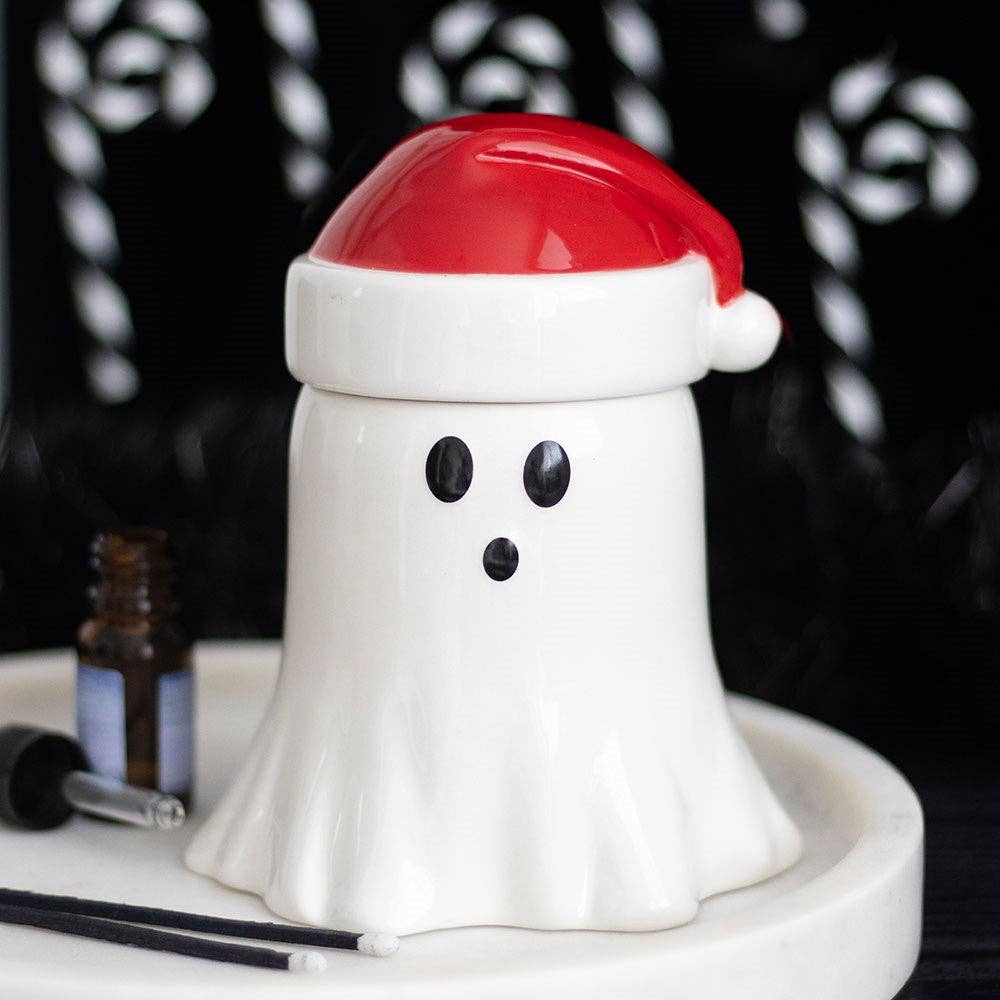 Geist mit Weihnachtsmannmütze Öl-Brenner und Wachswärmer