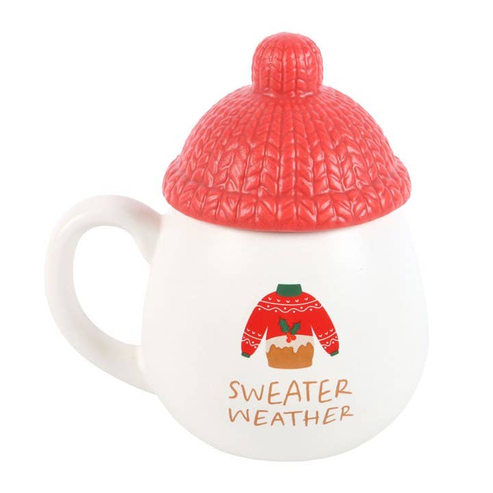 Weihnachtstasse mit Deckel und Strickmuster-Mütze