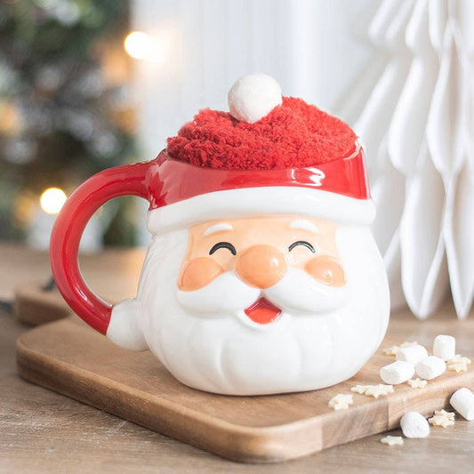 Set mit fröhlichem Weihnachtsmann – Tasse und Socken