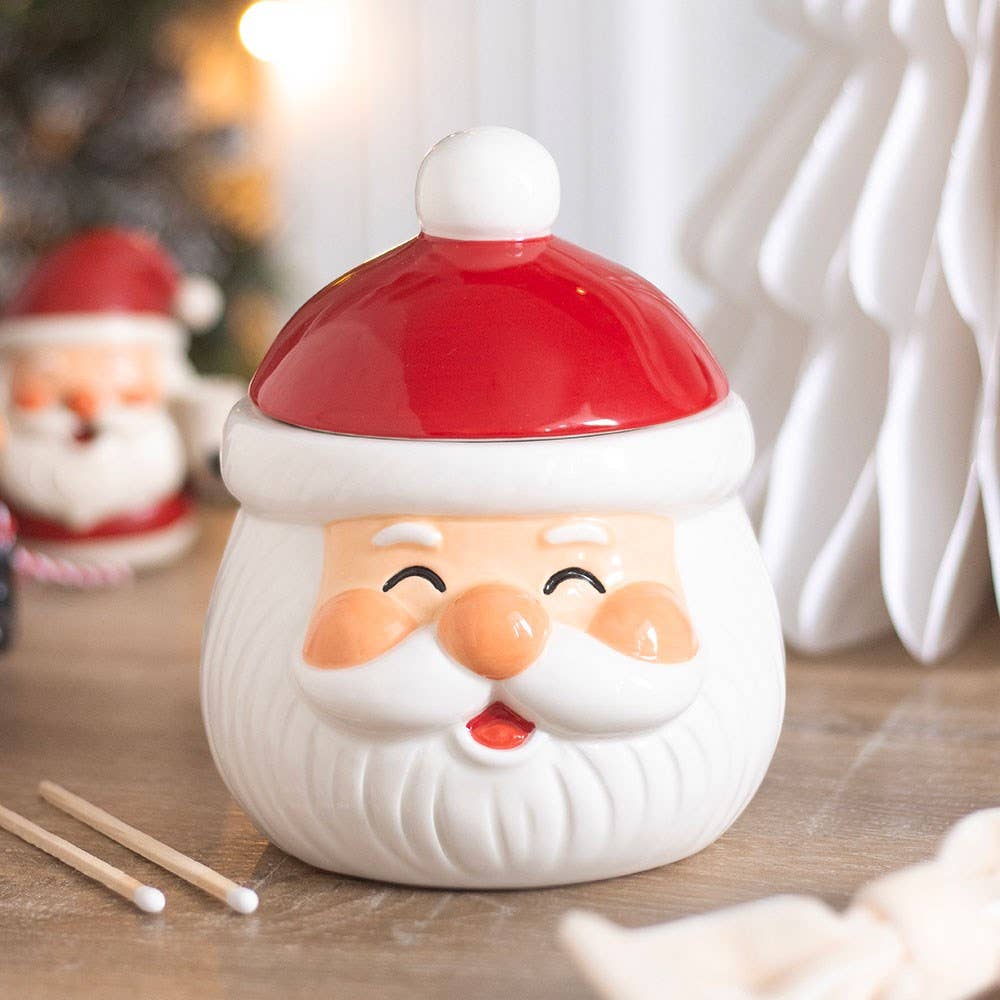 Fröhlicher Weihnachtsmann Ölbrenner und Wachswärmer