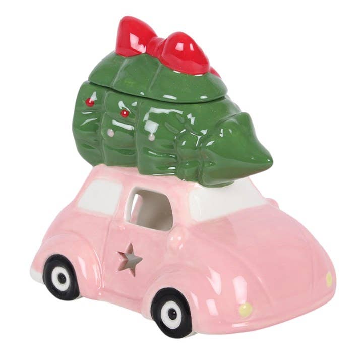 Rosa Auto mit Weihnachtsbaum-Ölbrenner